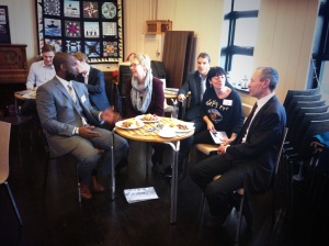 Sport and Culture Minister John Griffiths enjoying breakfast with footballer Nathan Blake and representatives from Street Games and its partner Coca Cola